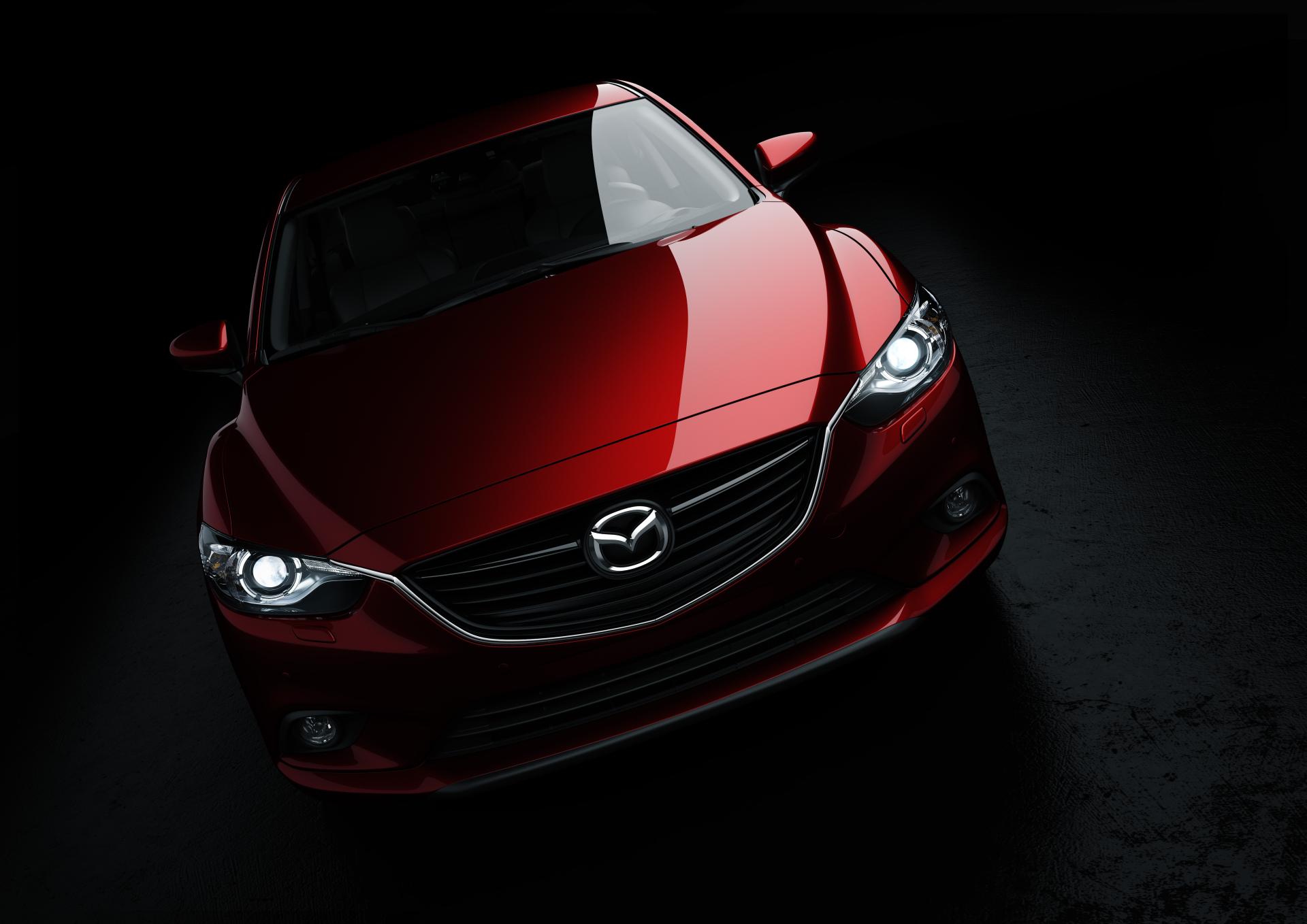 красный автомобиль фара Mazda CX-7 загрузить