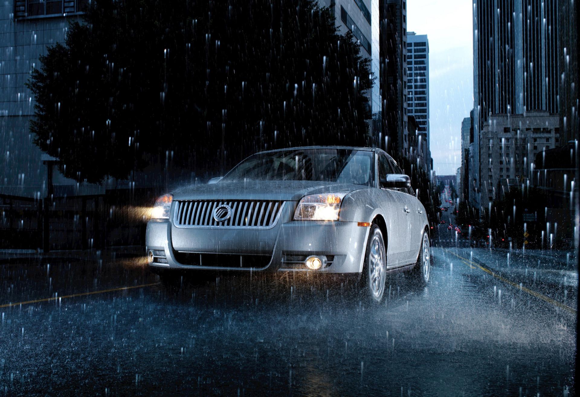 Автомобиль под каплями дождя загрузить