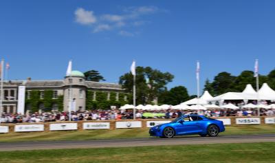 Taylor swift races a car in Goodwood festival of