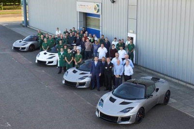 The first Lotus Evora 400 sports cars leave Lotus' Hethel headquarters, on the way to dealerships