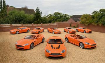 Unique Collection Of Eight Orange Aston Martins Offered Without Reserve At Bonhams|Cars Zoute Sale